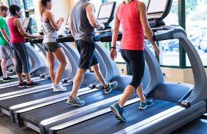 Runners on treadmills in a fitness facility